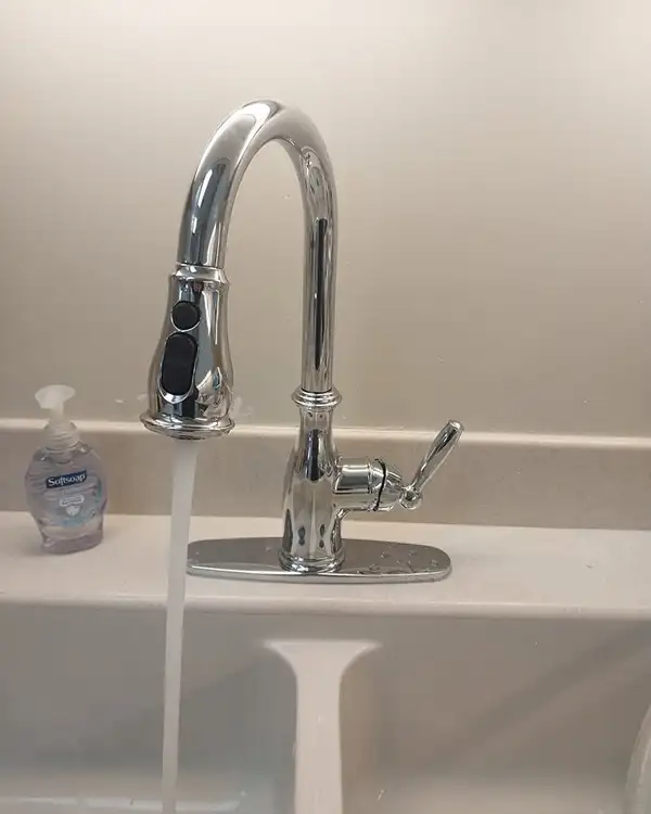 New chrome pull-down kitchen faucet