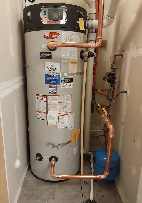 New high-efficiency gas water heater installed by Eruption Plumbing & Drains