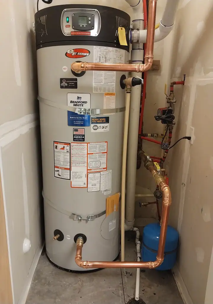 New high-efficiency gas water heater installed by Eruption Plumbing & Drains