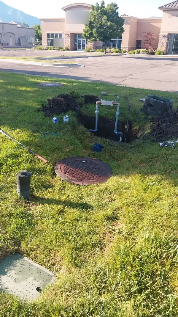 Commercial water service excavation in a lawn